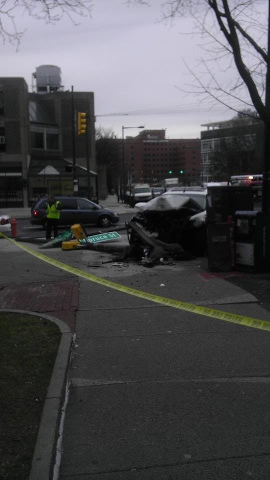 	A car knocked down a street pole around the interaction of 38th and Spruce Friday afternoon. 