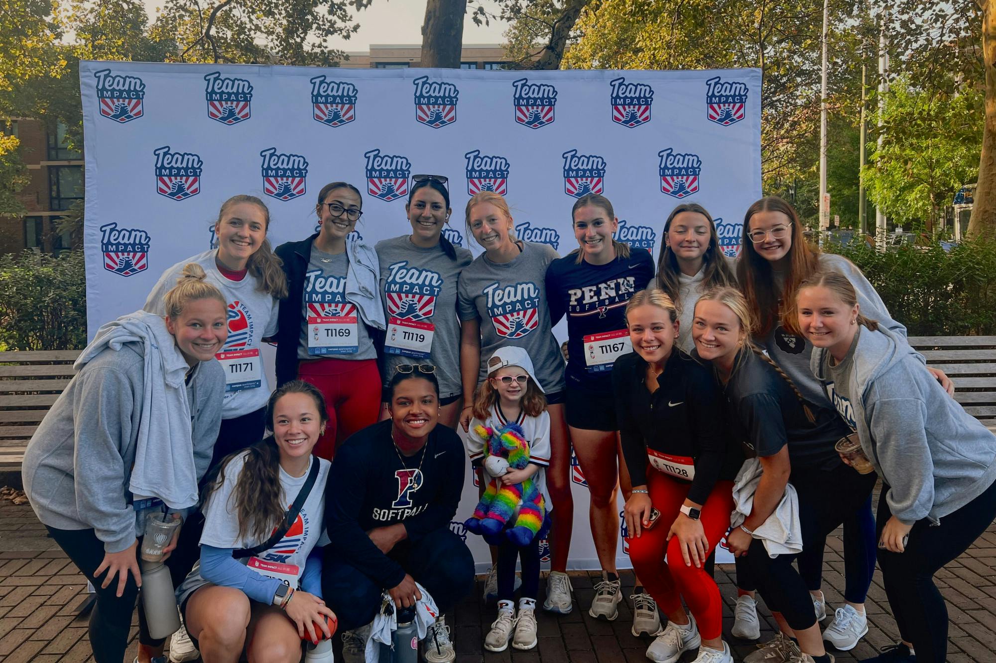Team IMPACT and Penn Softball (Photo courtesy of Erin Sullivan).jpg