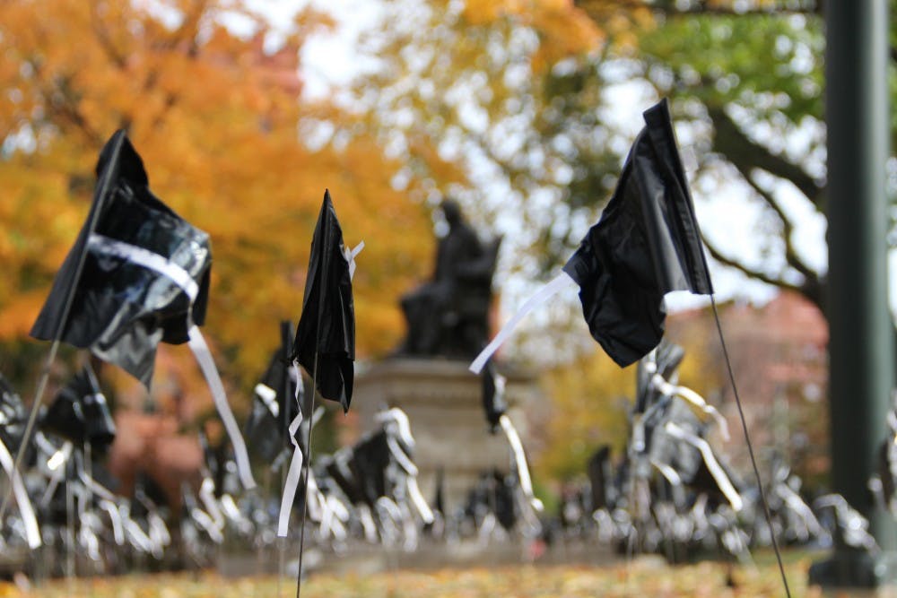 Penn Students for Justice in Palestine planted black flags on College Green last week to raise awareness of Palestinians killed in the summer of 2014.