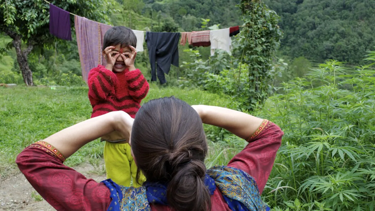 Junior Alex Iqbal pictured playing Simon Says with a young girl in Gajaar village in mid-July. Iqbal spent the entire summer immersed in Indian culture.