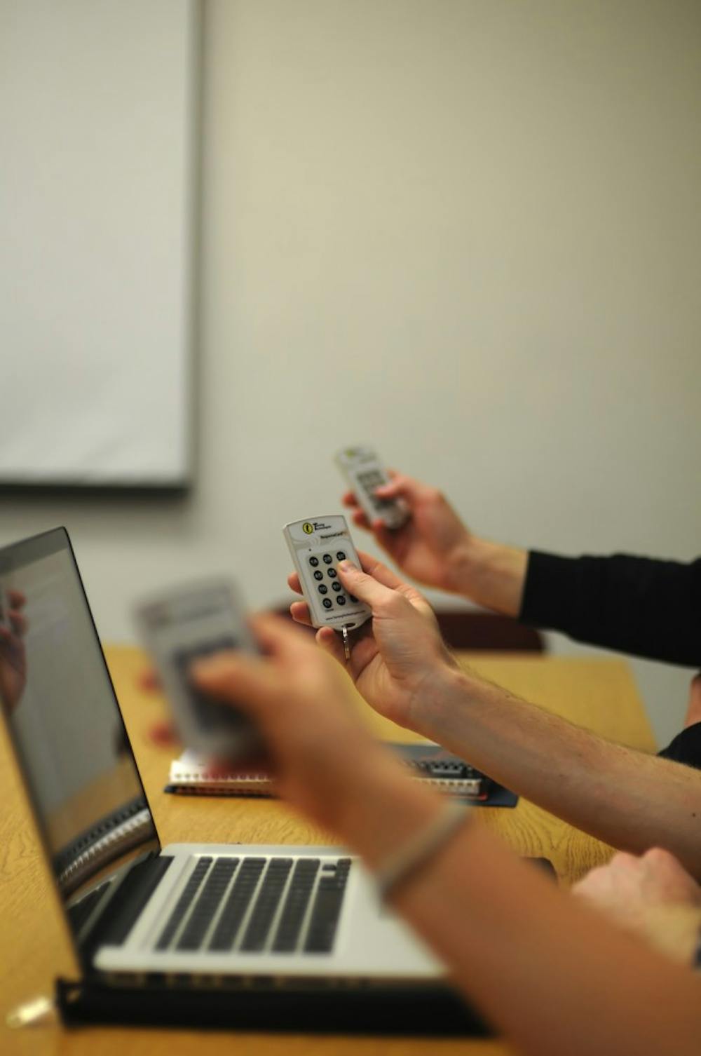 Professors use clickers to track attendance, participation