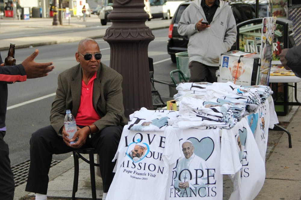 Stands with Pope merchandise lined Broad Street.