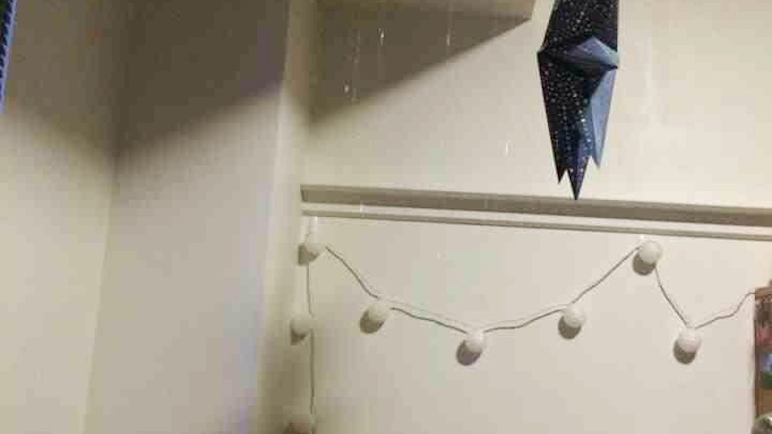 A pipe that had burst behind a wall led Silberling and other students to collect the water accumulating in their dorm rooms in buckets.