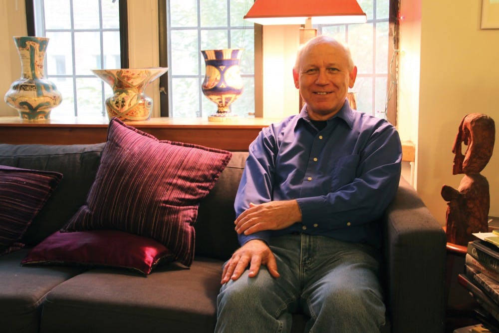 Dennis DeTurck, pictured here in his apartment in Riepe College House, is stepping down from his role as dean of the College of Arts and Sciences. 