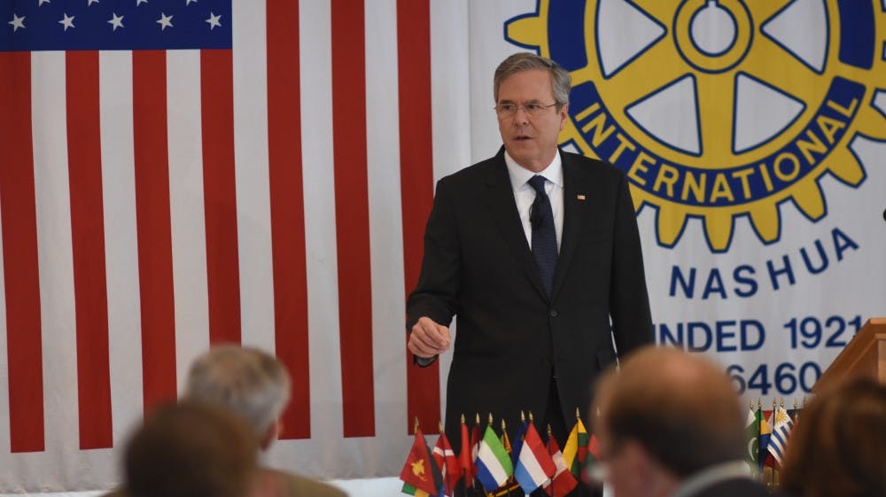 In general, I got really lucky with my positioning this weekend. I am not a trained photographer, but I happened to land in the right place at each of these events, including this one with Gov. Bush.