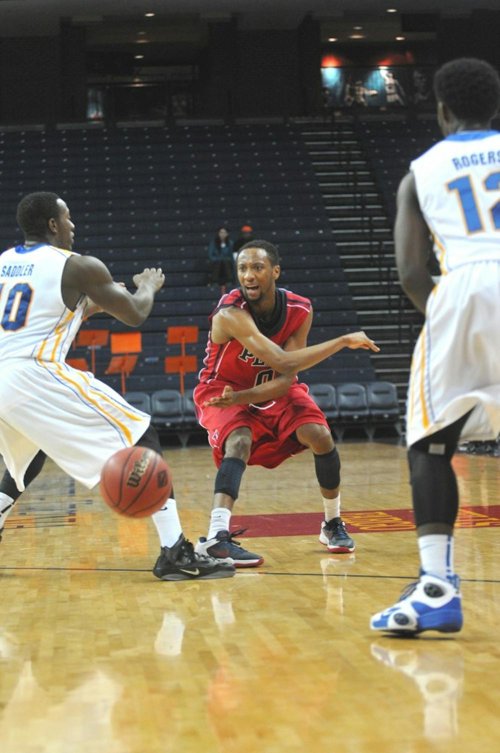 Men's hoops played in the NIT Tip-Off tournament in Charlottesville, Virginia against University of Delaware. The Quakers lost and Fran Dougherty was the high scorer. Miles Cartwright and two other players fouled out. 