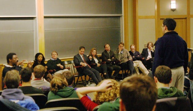 Thirteen members of the Board of Trustees addressed concerns of class size, financial aid and facilities, in the first student-trustee open forum in College history, held Friday night in Filene Auditorium.