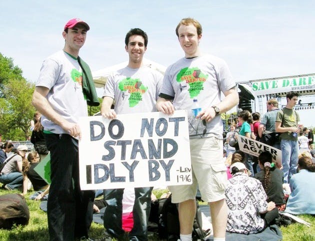 Chase Hogle '07, Adam Shpeen '07, and Evan Michals '07 (l-r) attend a rally in Washington, D.C. for the victims of the Darfur genocide. The rally urged American intervention in the ongoing genocide.