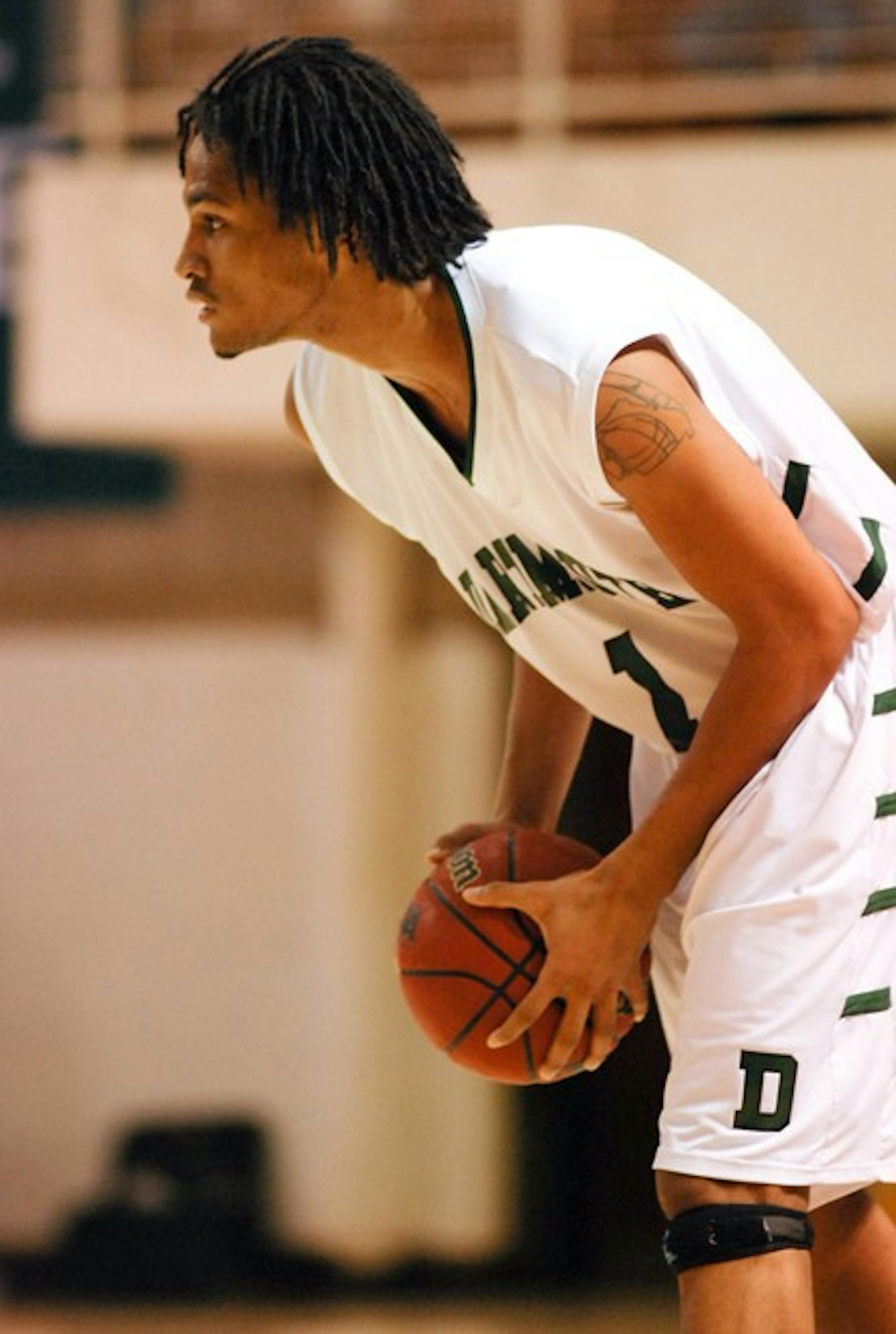 Alex Barnett '09 hit a seven-footer with 1.3 seconds left to tie the game.