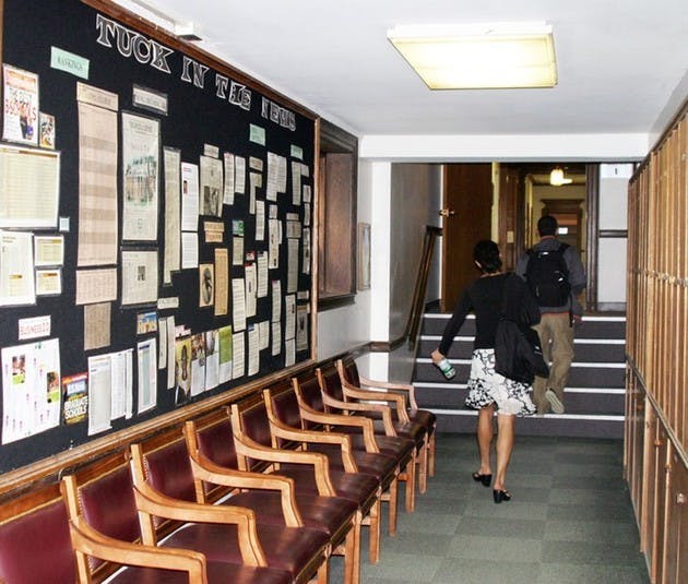 Tuck Students pass by the 