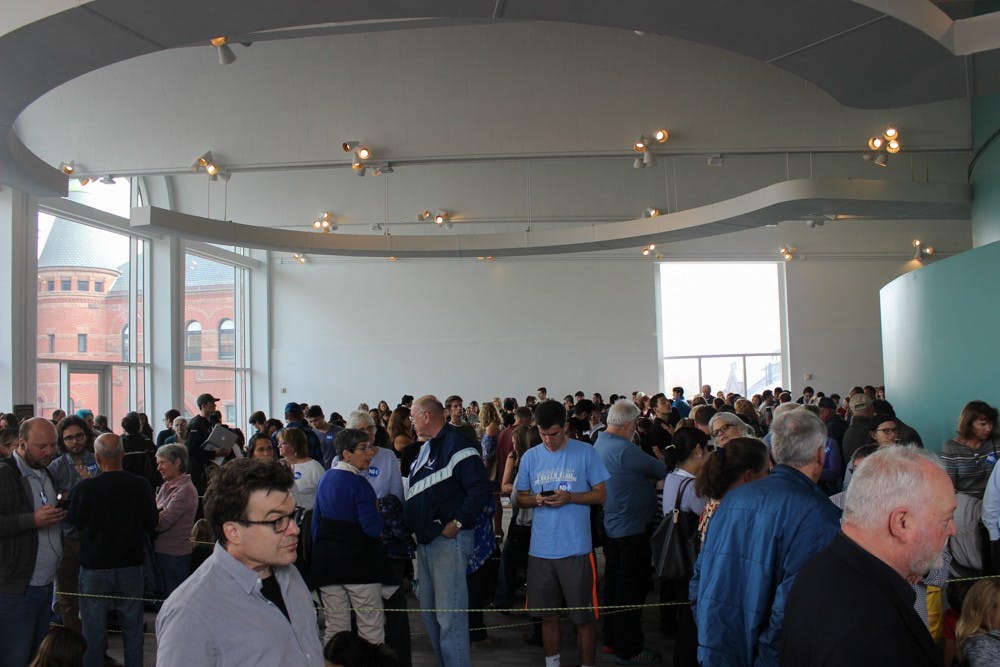 Students and community members wait to hear Bill Clinton speak on Monday morning.