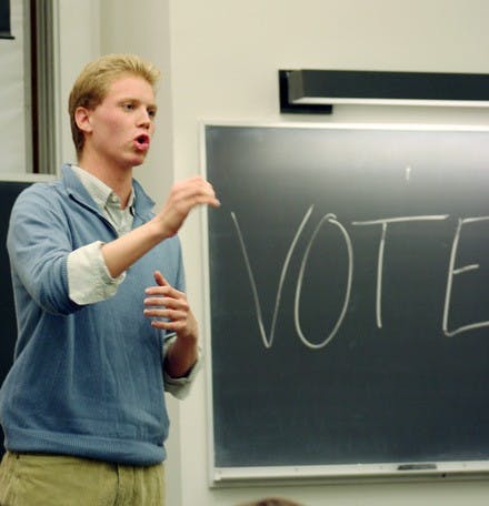 Derek Summerville '11 campaigns Tuesday night for freshman Class Council president. He says his campaign is more 'mature' than those of his peers.