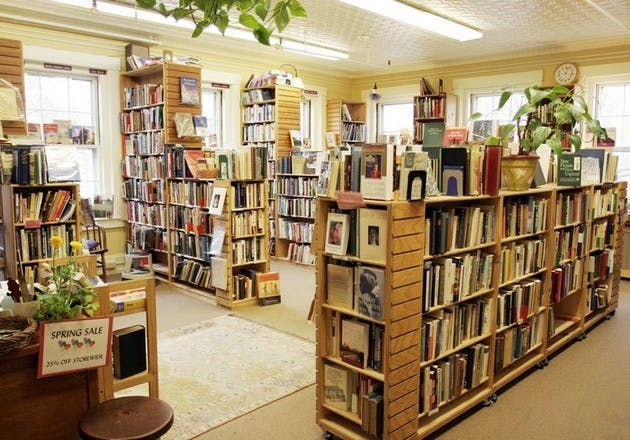 Corlan Johnson, the owner of Left Bank Books used books store, is looking to sell the operation due to recent competition on Main Street.