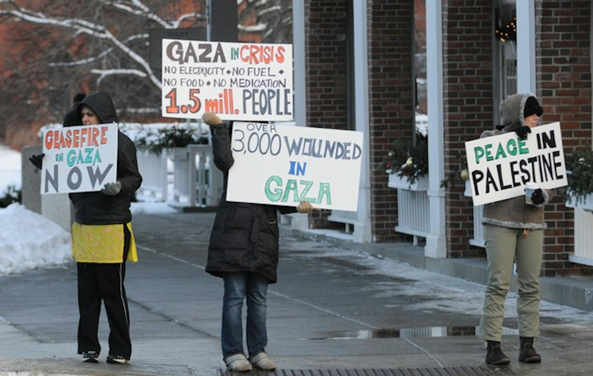 Community members and students called for peace in Palestine at a Friday demonstration held at the intersection of Main Street and Wheelock Street.