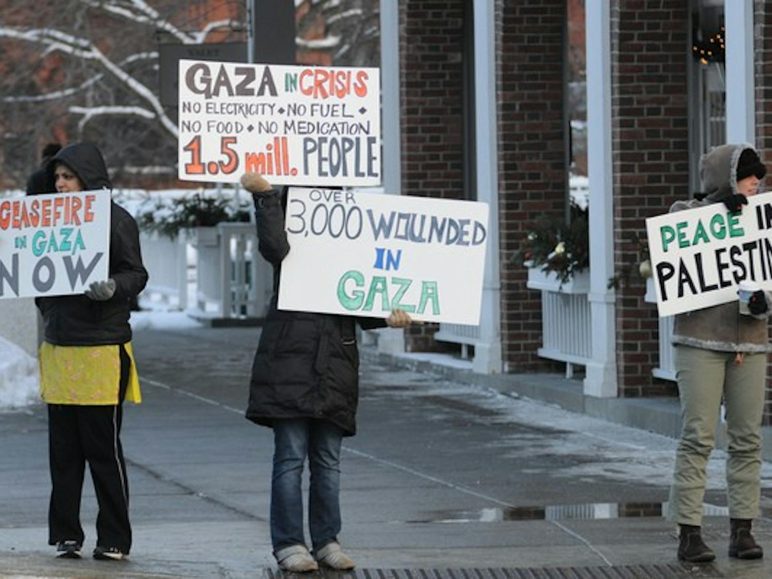 Community members and students called for peace in Palestine at a Friday demonstration held at the intersection of Main Street and Wheelock Street.