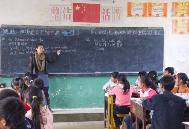 A fellow of the China Education Initiative addresses her middle school class in Yunnan Province, China.