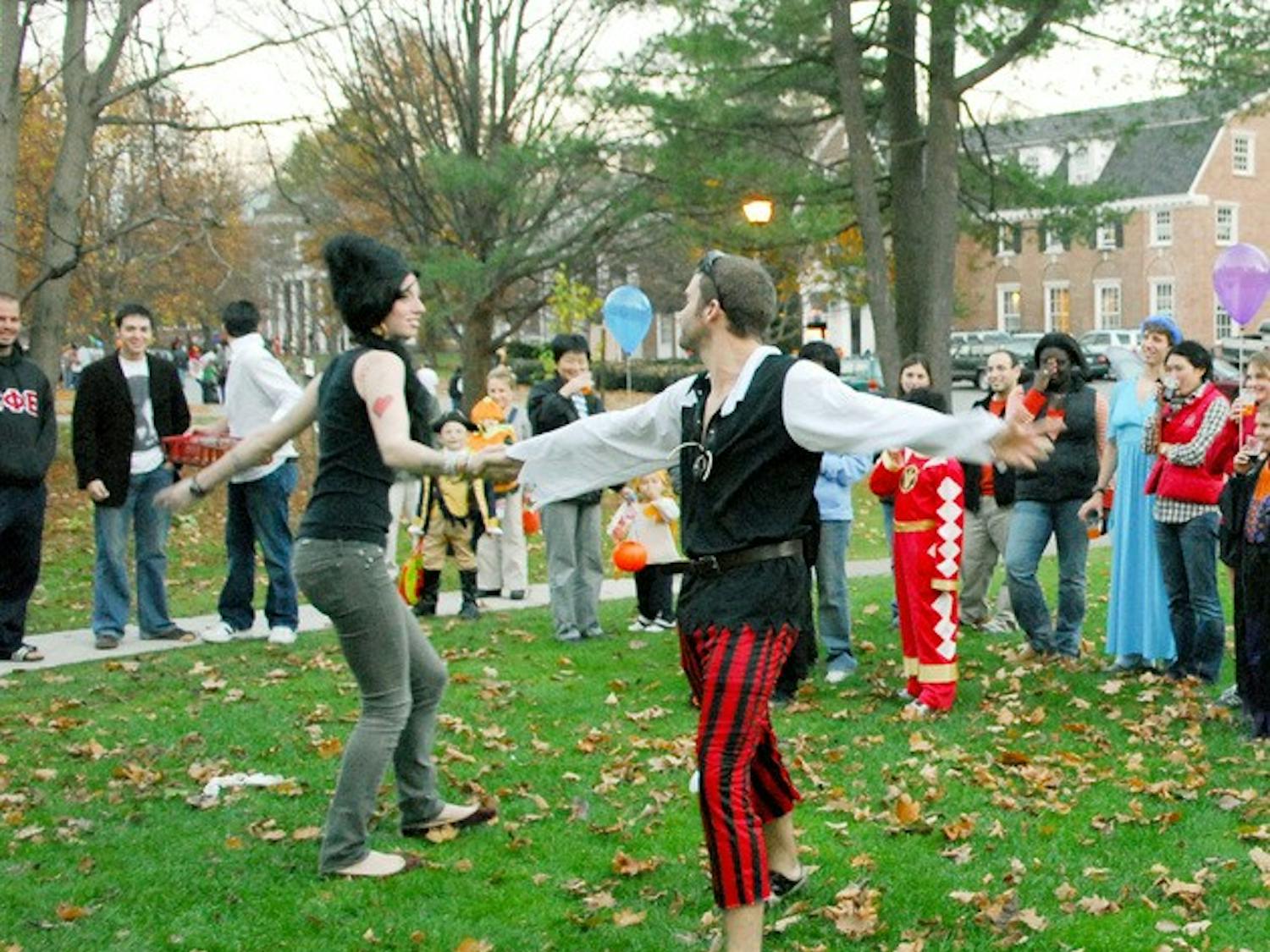 The Dog Day Players perform at Sigma Phi Epsilon fraternity last week during DREAM\'s Halloween Carnival.