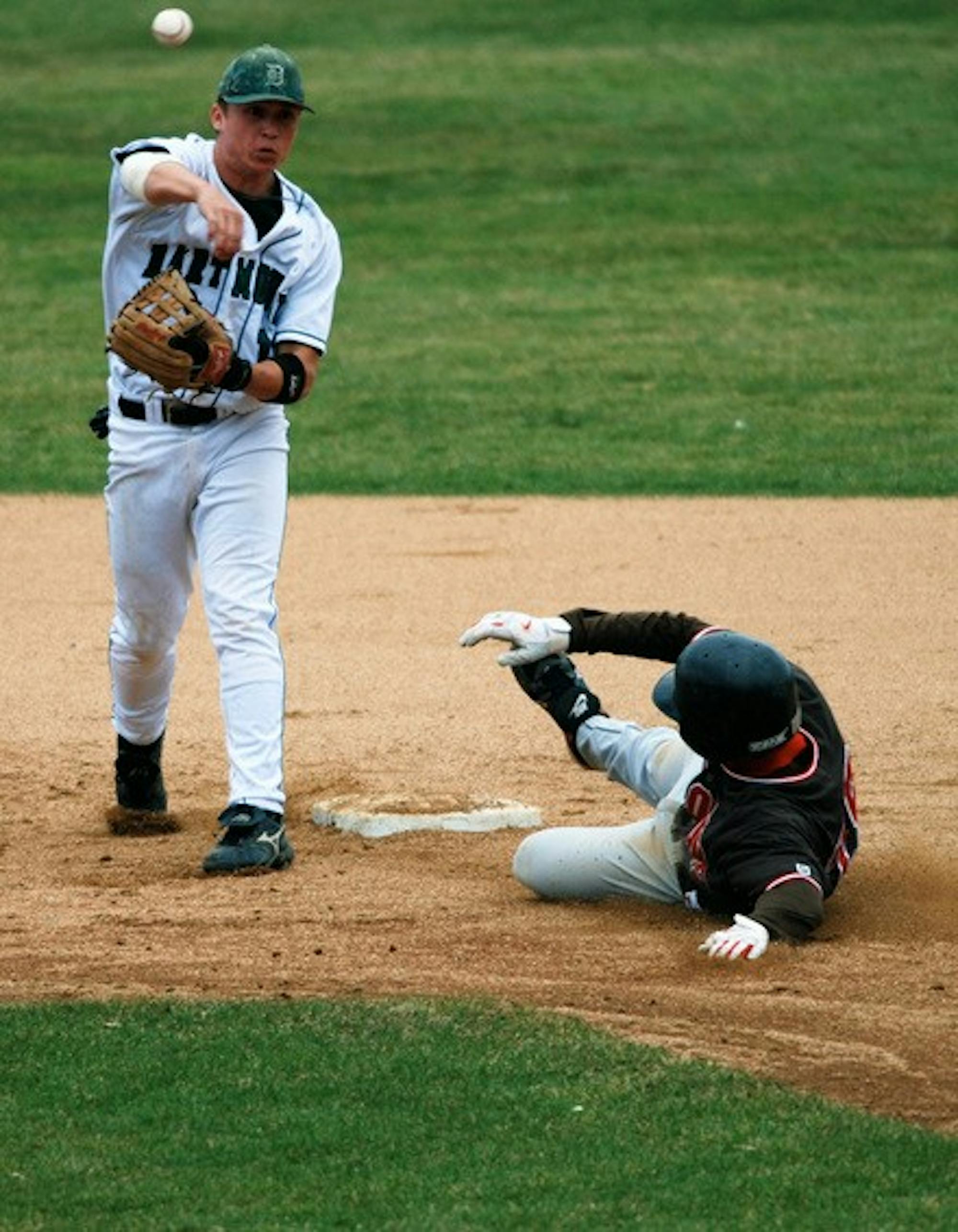 Jason McManis '08 tries to turn a double play against the Bears.