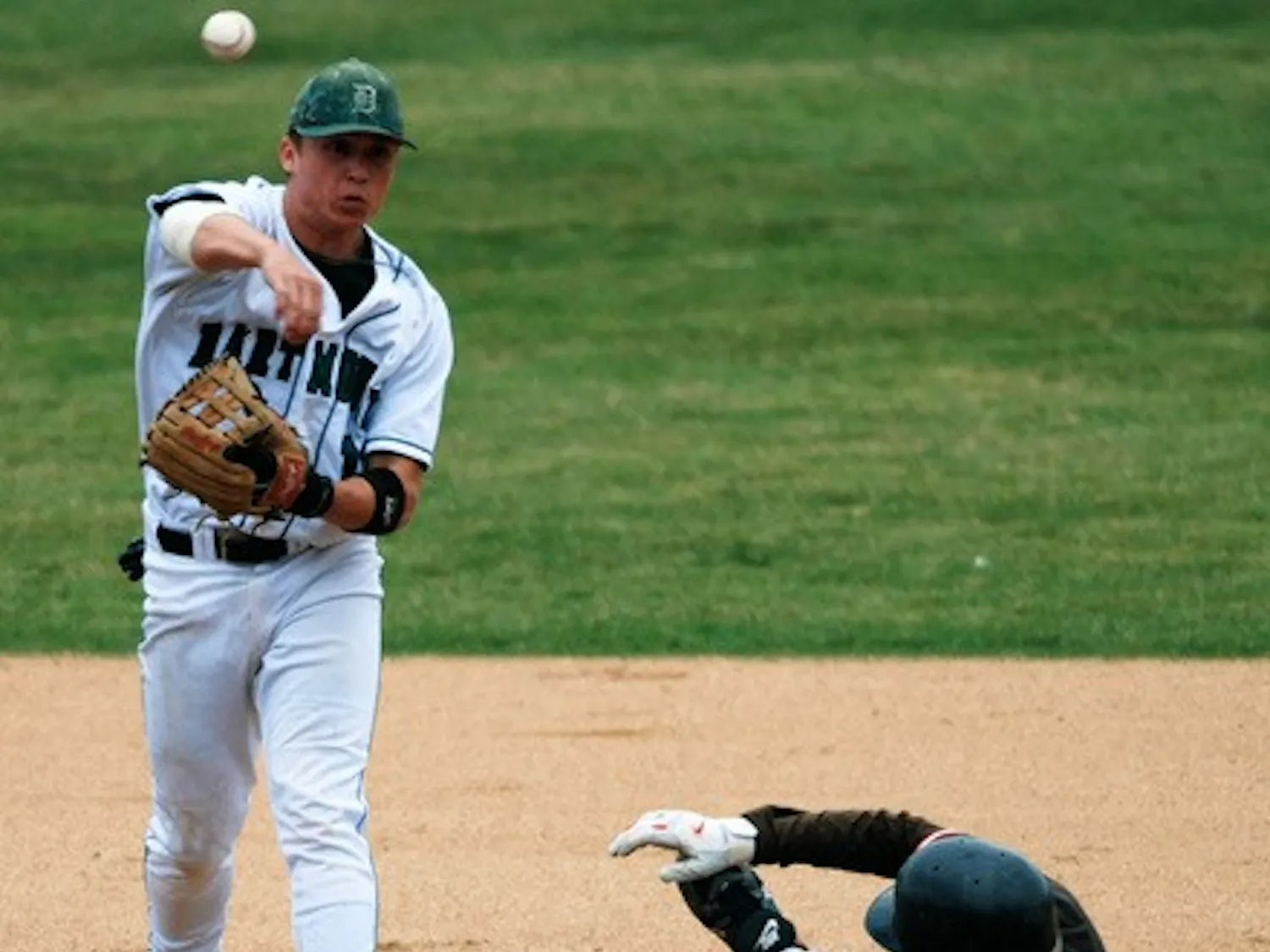 Jason McManis '08 tries to turn a double play against the Bears.