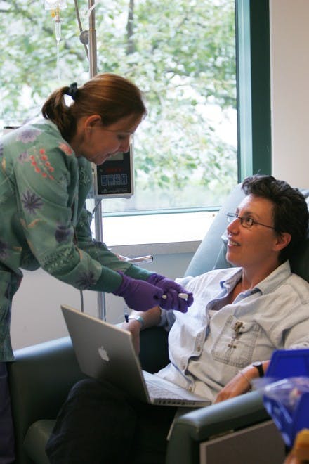 NCCC Patient Michele Meyers with Nurse Tracy J. Ramsay during a infusion.