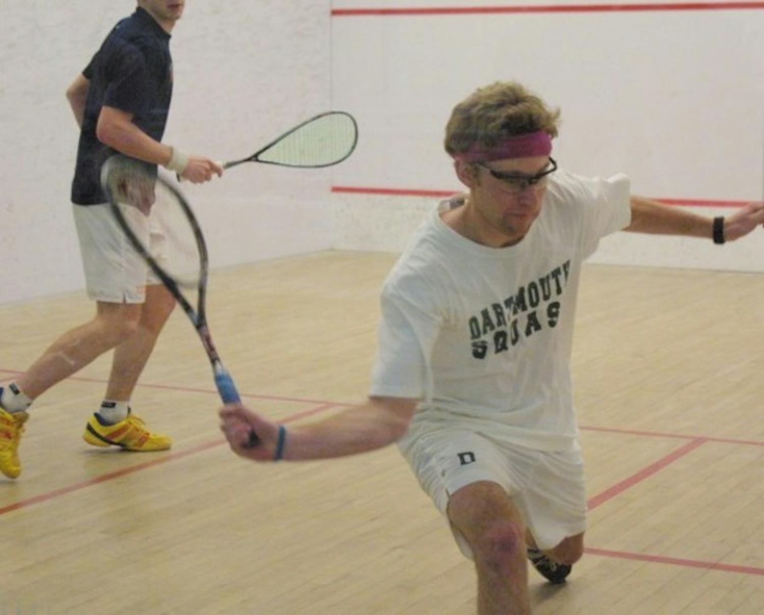 Co-captain Todd Wood '07, sporting a purple headband, has led the men's squash team to its early successes.