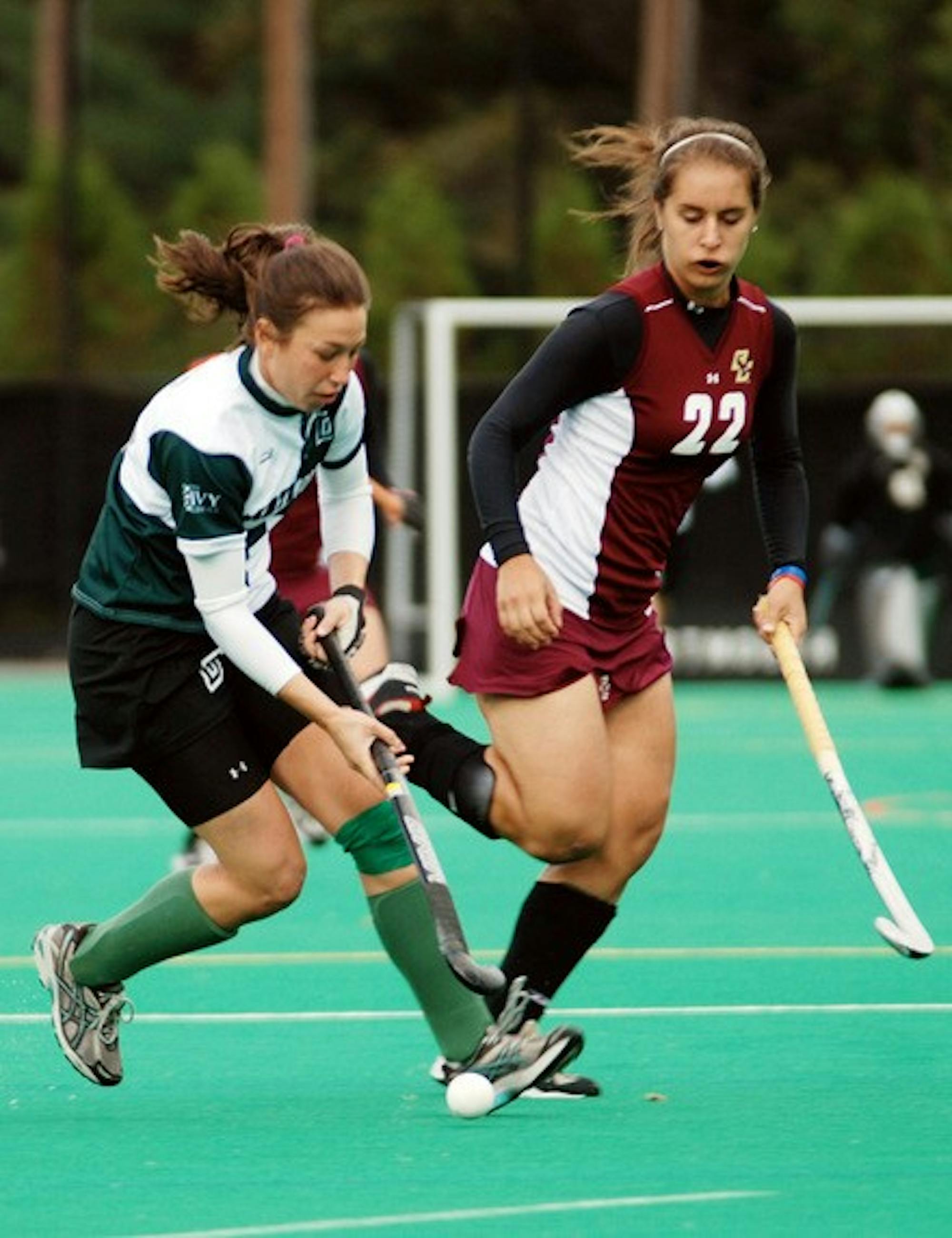 Lizzie Blidner '08 controls the ball against some aggressive defense.