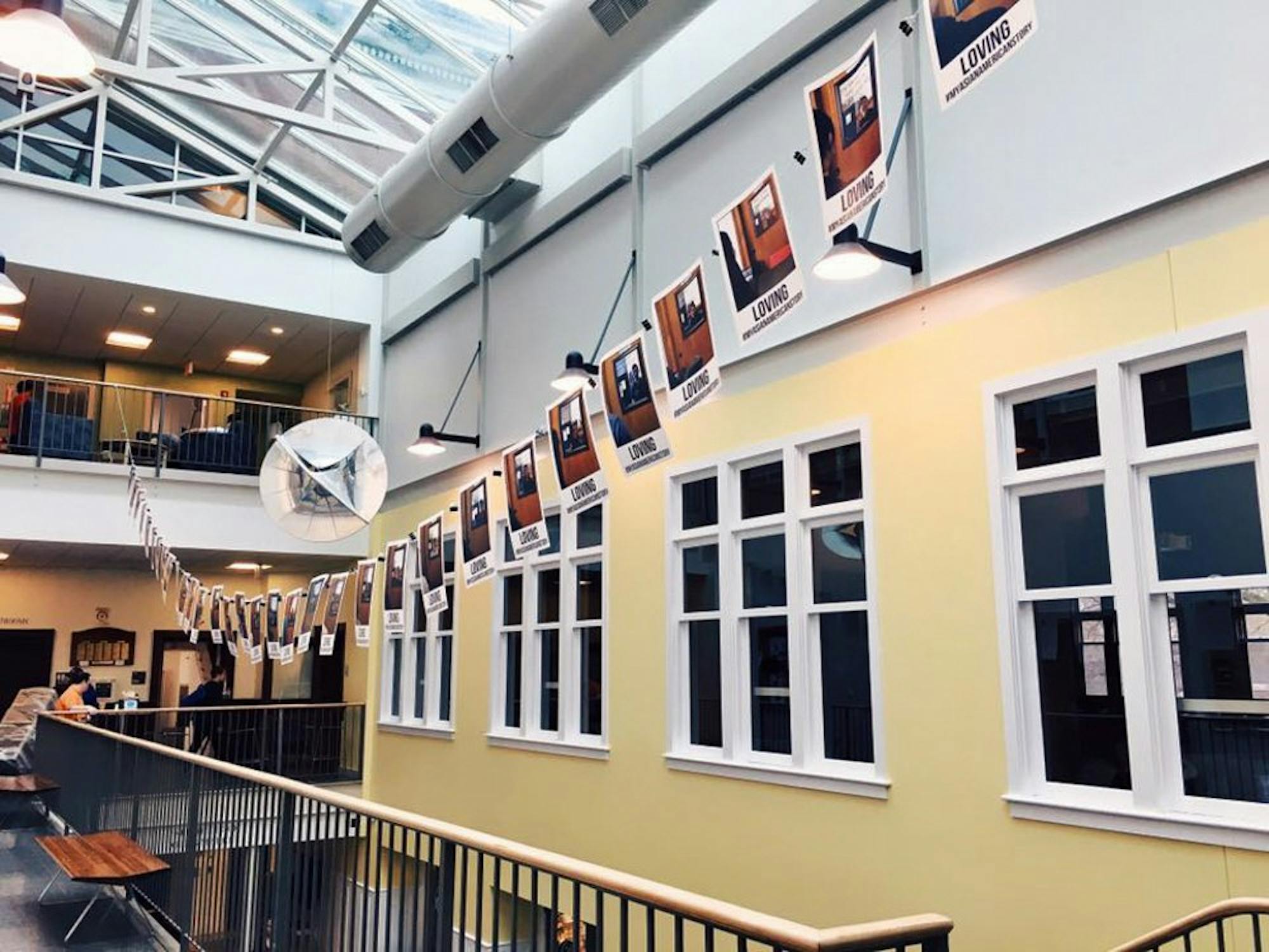 Portraits from the APAHM project hang in the Collis Center.