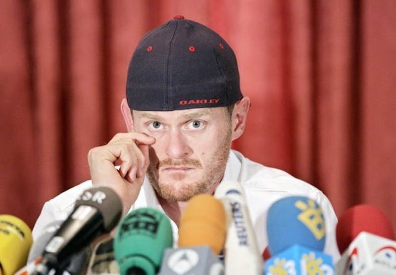 US cyclist Floyd Landis listen to questions from the media during his news conference in Madrid, Friday, July 28, 2006. Landis said he has naturally high testosterone levels, and will undergo tests to prove he is not guilty of doping at the Tour de France. (AP Photo/Paul White)
