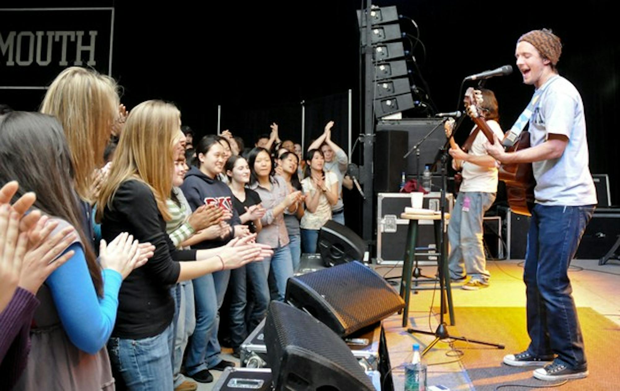 The sold-out crowd clap in unison to the melodies of Jason Mraz at Thursday night's concert in Alumni Hall.