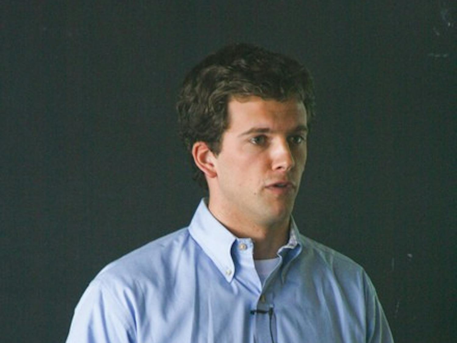 John Cunningham '02 discusses his neuroscience research on Monday.