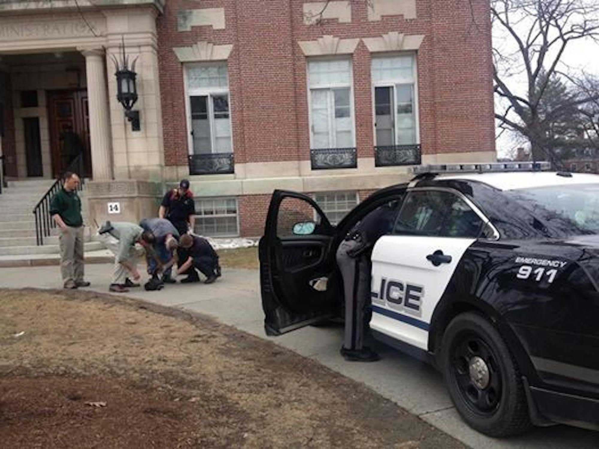 David Vincelette '84 was escorted out of Parkhurst Hall by Hanover Police Monday afternoon.