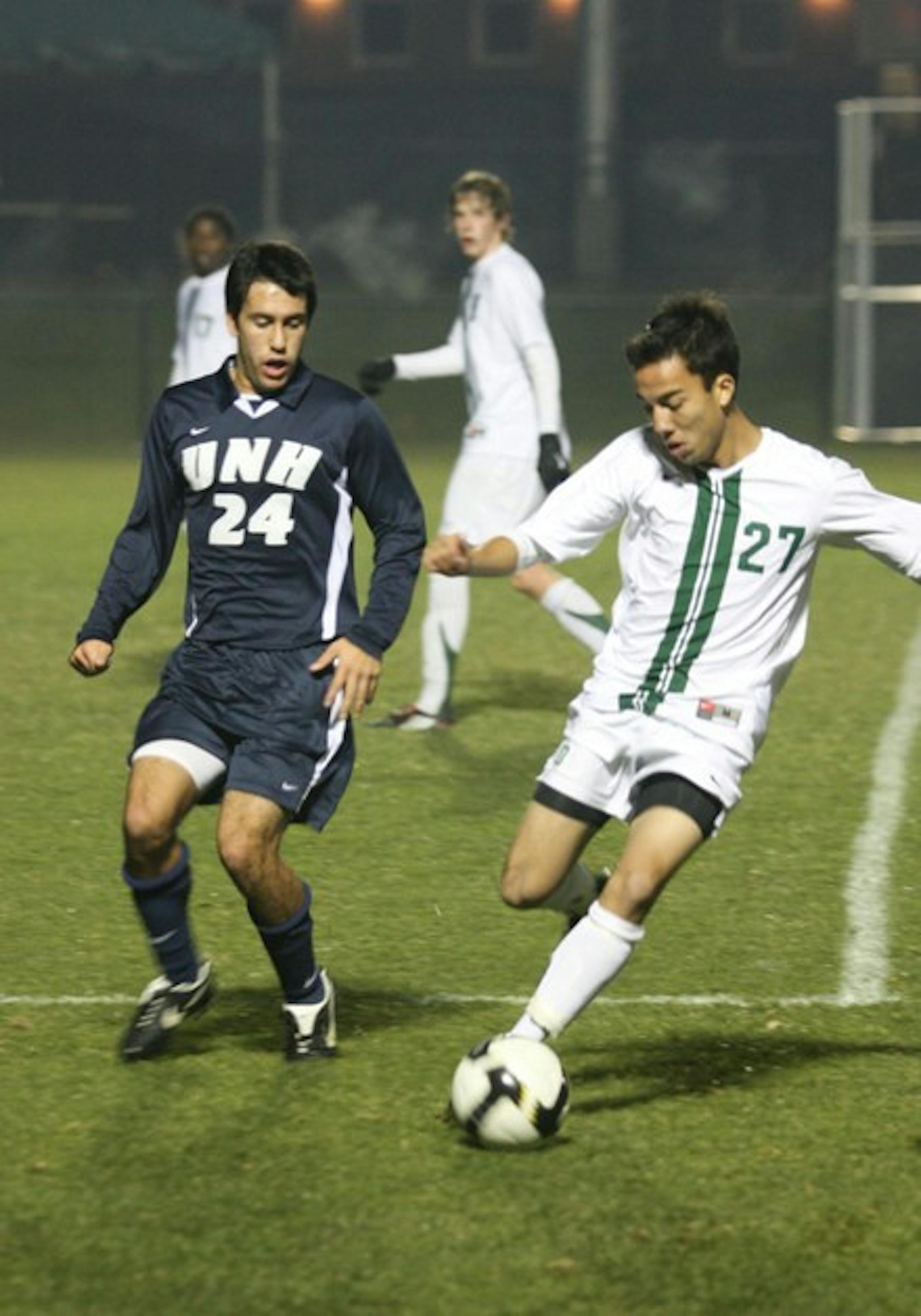 Andrew Olsen '11 notched the game-winning goal eight minutes into overtime as the Big Green outlasted UNH, 2-1.