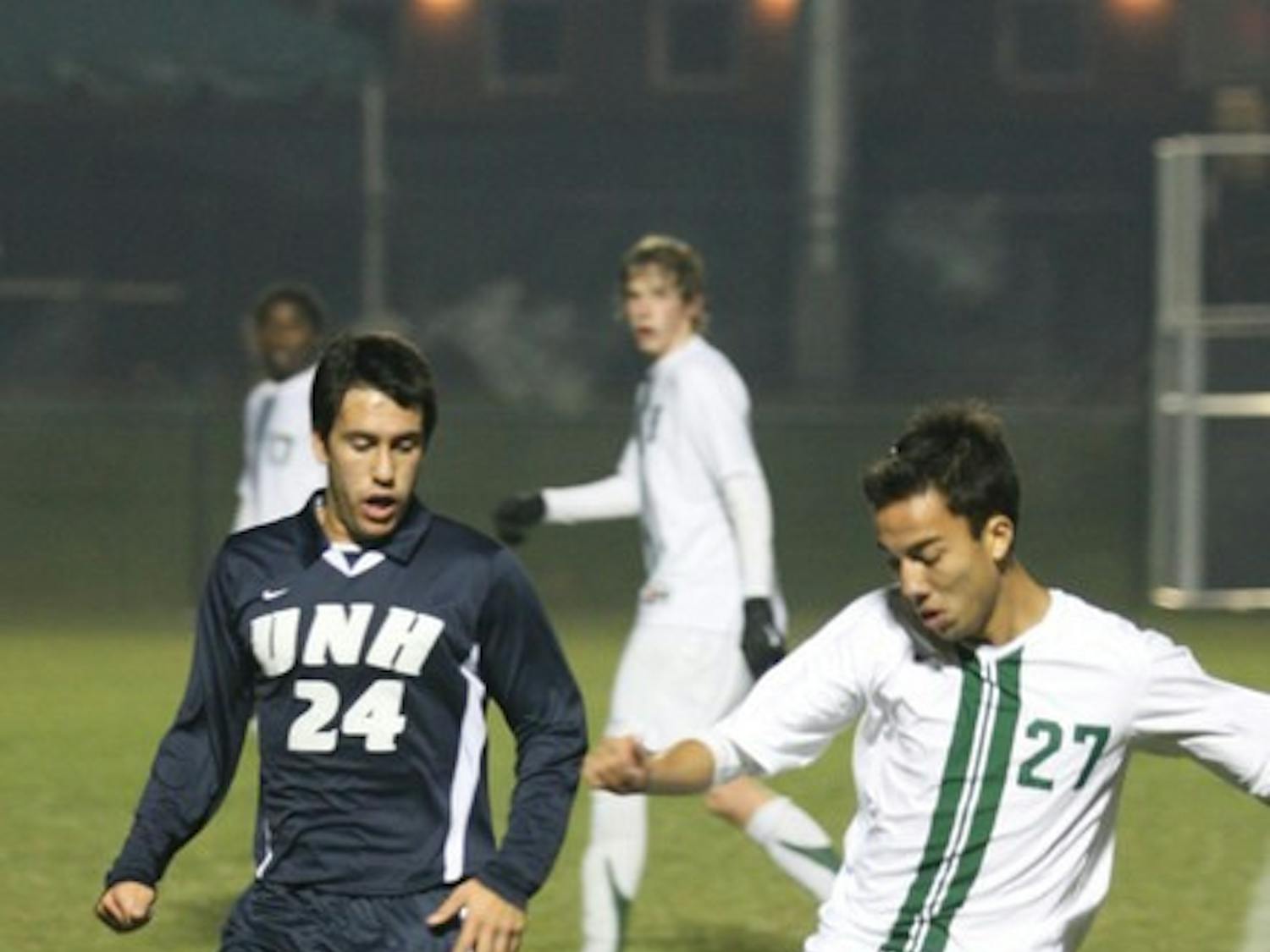 Andrew Olsen '11 notched the game-winning goal eight minutes into overtime as the Big Green outlasted UNH, 2-1.