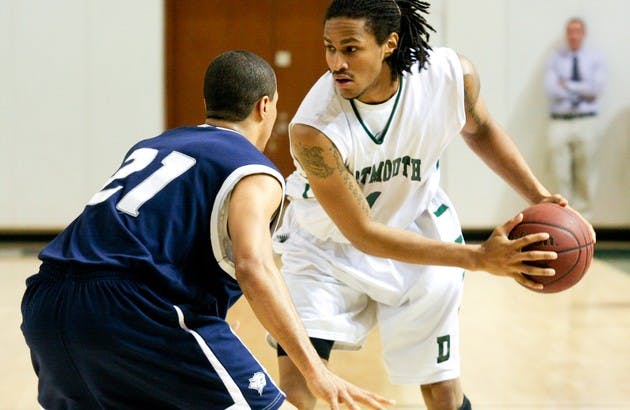 Alex Barnett '09 led the Big Green with 30 points to topple Harvard 75-66 in overtime Saturday evening.