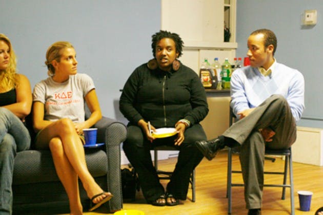 Sophomores Whitney Coombs, Victoria Maceira and Alex Cook listen to Leah Prescott (second from right) during the MAV forum at KDE on Wednesday. The forum dealt with recent incidents of sexual assault on campus.