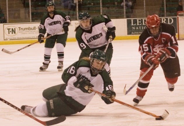 Dartmouth brought the ECACHL championship trophy to Hanover by first squashing St. Lawrence in the semifinals on Sunday.
