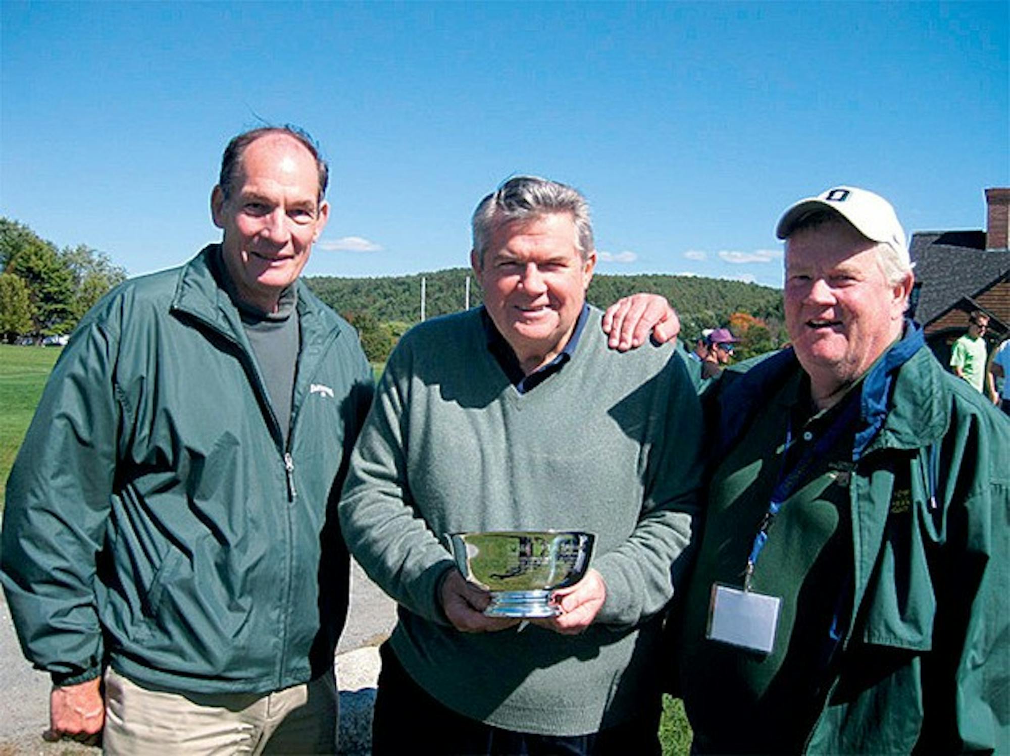 J. Michael Murphy '61, pictured center, is running for the Association of Alumni presidency as a petition candidate. 