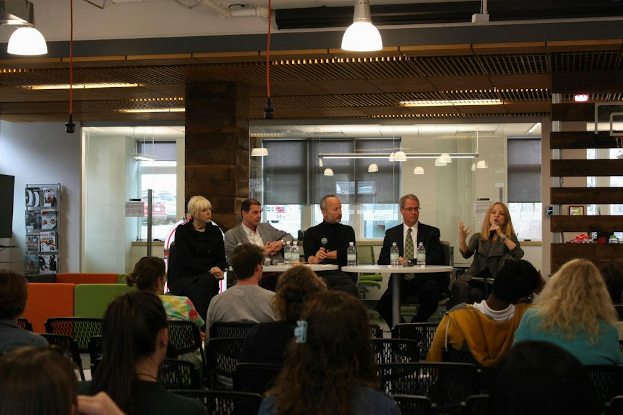 A panel of artists and entrepreneurs shared their perspectives on digital rights at the DEN Innovation Center on Monday.