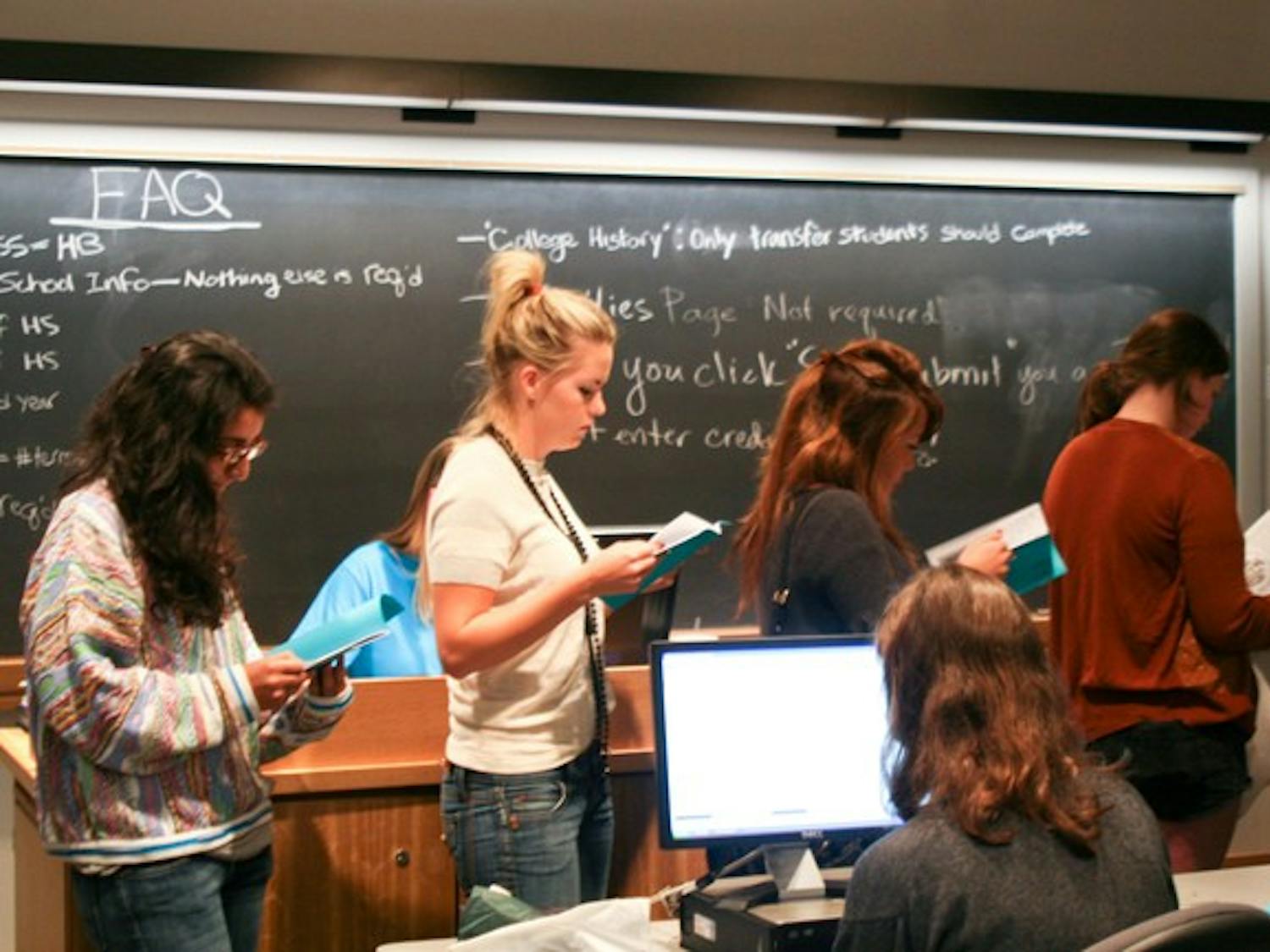 Women register to participate in fall sorority rush, which will be conducted with the use of a new computer system, Select and Rank. The system is aimed at better matching women and sororities.