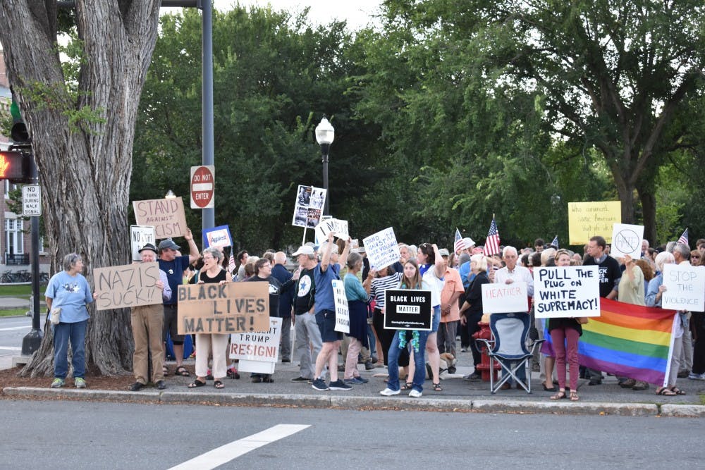 A crowd of around 50 Upper Valley community members gathered on the Green.