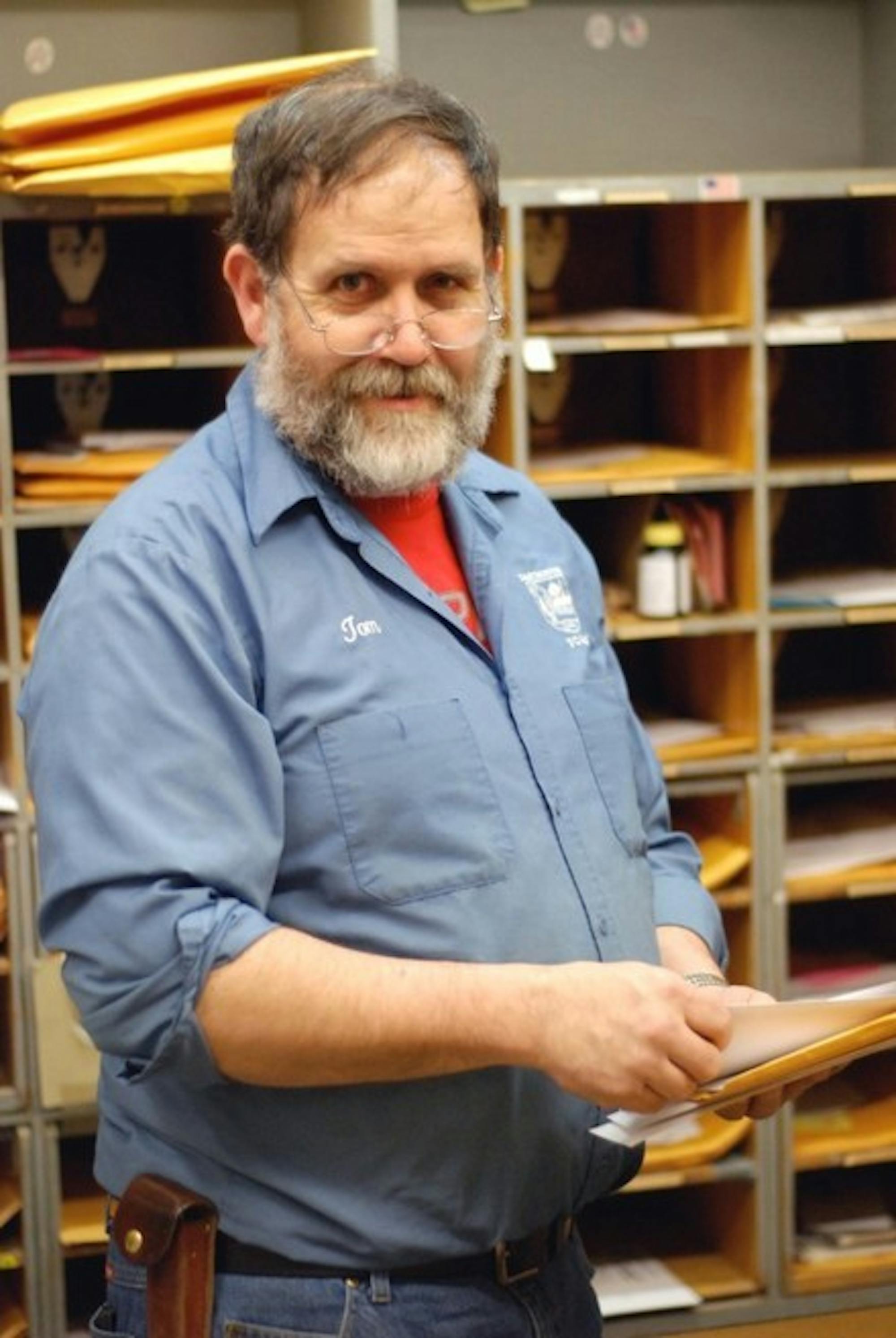 Tom Stebbins starts his day bright and early at 7:30 a.m. to manage the mail at the Hinman Post Office with Howard Durkee (not pictured).