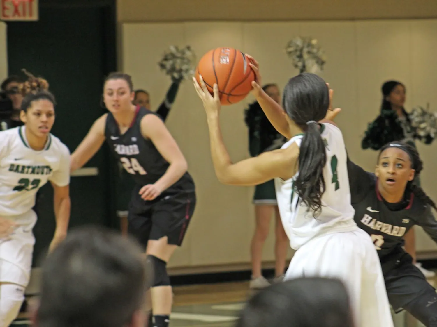 The women's basketball team won against Brown University before losing a close game to Yale University.