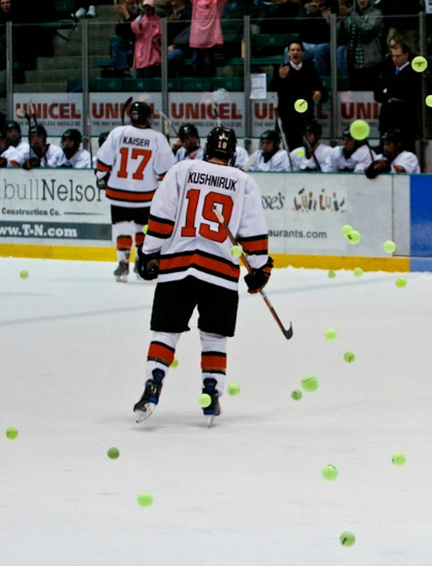 The Big Green student section fired tennis balls onto the ice after Scott Fleming '11 scored Dartmouth's first goal against Princeton Friday night.