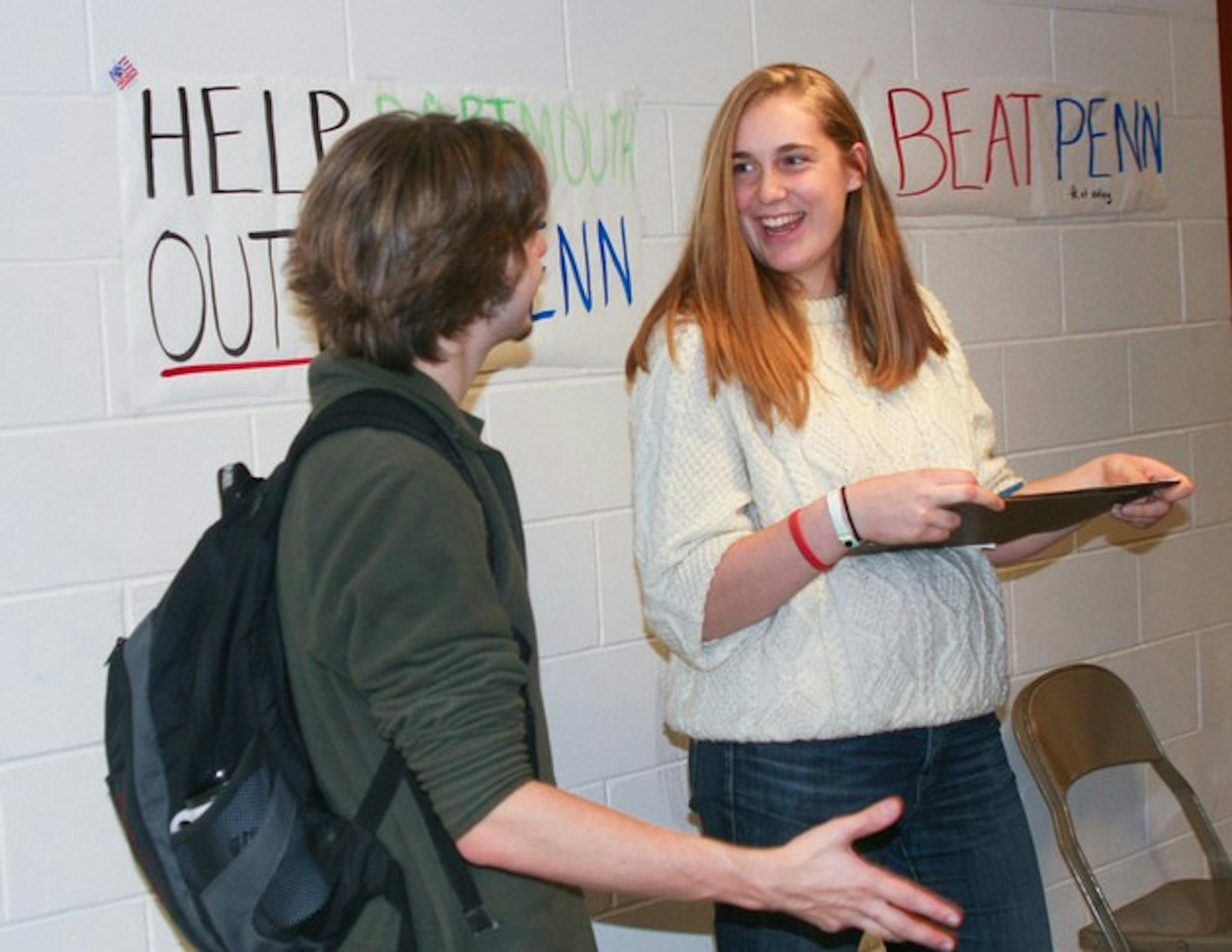 Students tally the number of Dartmouth voters exiting the 2008 election polls for the College's competition with Penn last Tuesday.