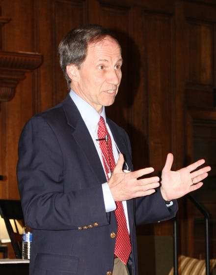 Al Mulley '70, chair of the presidential search committee, meets with community members to solicit feedback in Collis Common Ground Friday afternoon.