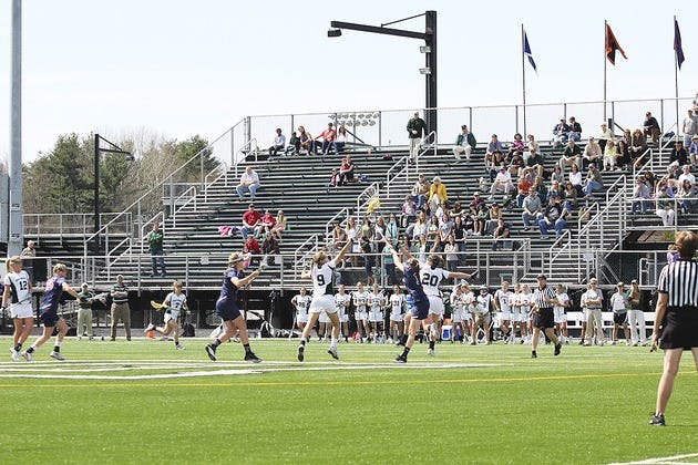 Sarah Plumb '12 scored three goals and broke a program record for draw controls against Penn.
