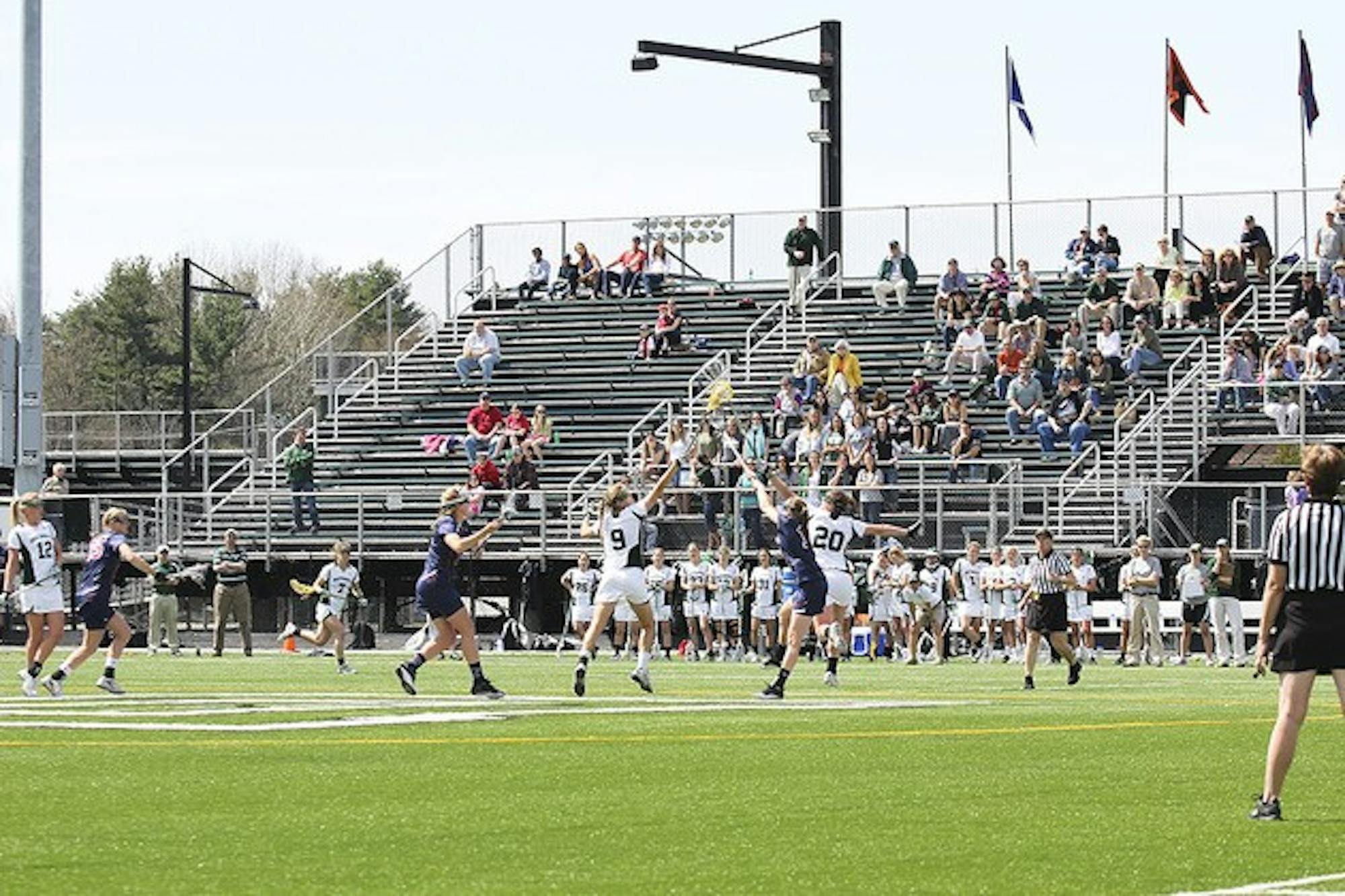 Sarah Plumb '12 scored three goals and broke a program record for draw controls against Penn.