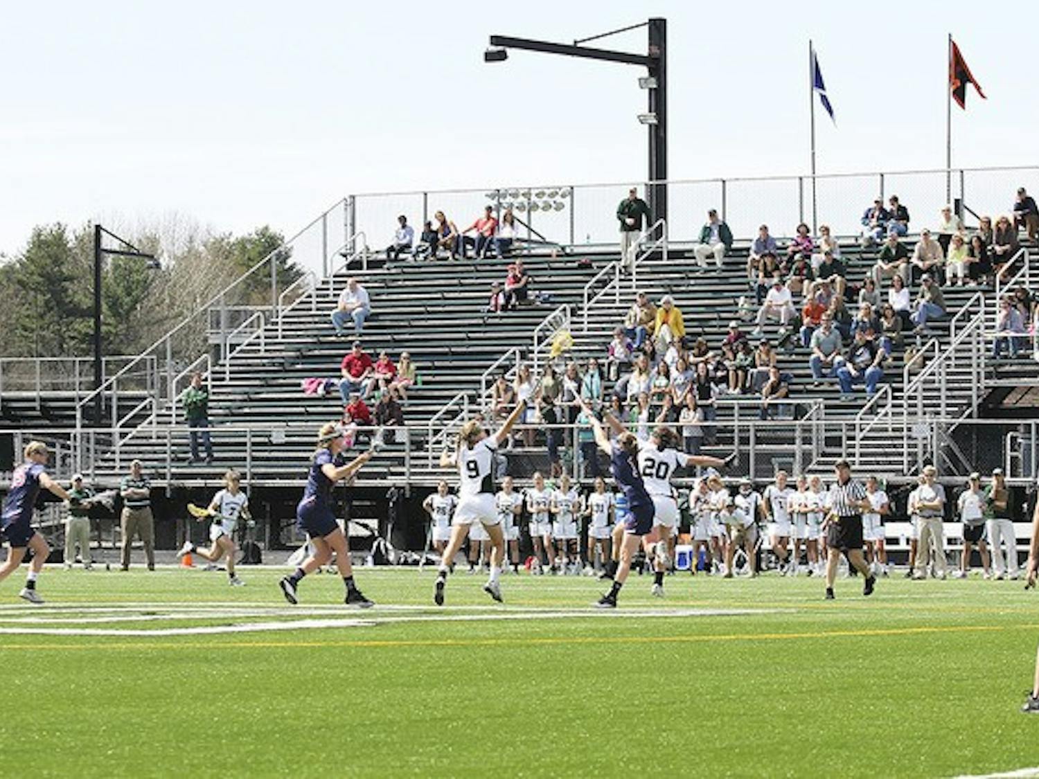 Sarah Plumb '12 scored three goals and broke a program record for draw controls against Penn.