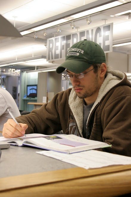 Cary Stathopoulos 10, a member of the swim team, studies in Berry Library before leaving for the EISL championship meet in Boston on Wednesday.