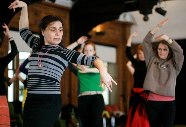 Soledad Barrio, lead dancer and founder of Noche Flamenca, teaches a beginner flamenco class to a group of Dartmouth students.